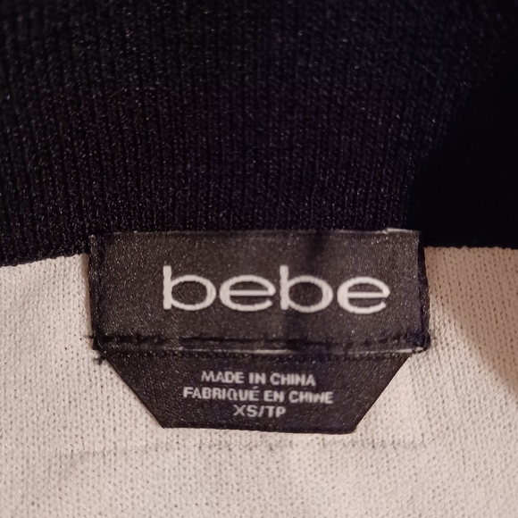 bebe Mini Skirt • XS - Picture 7 of 8